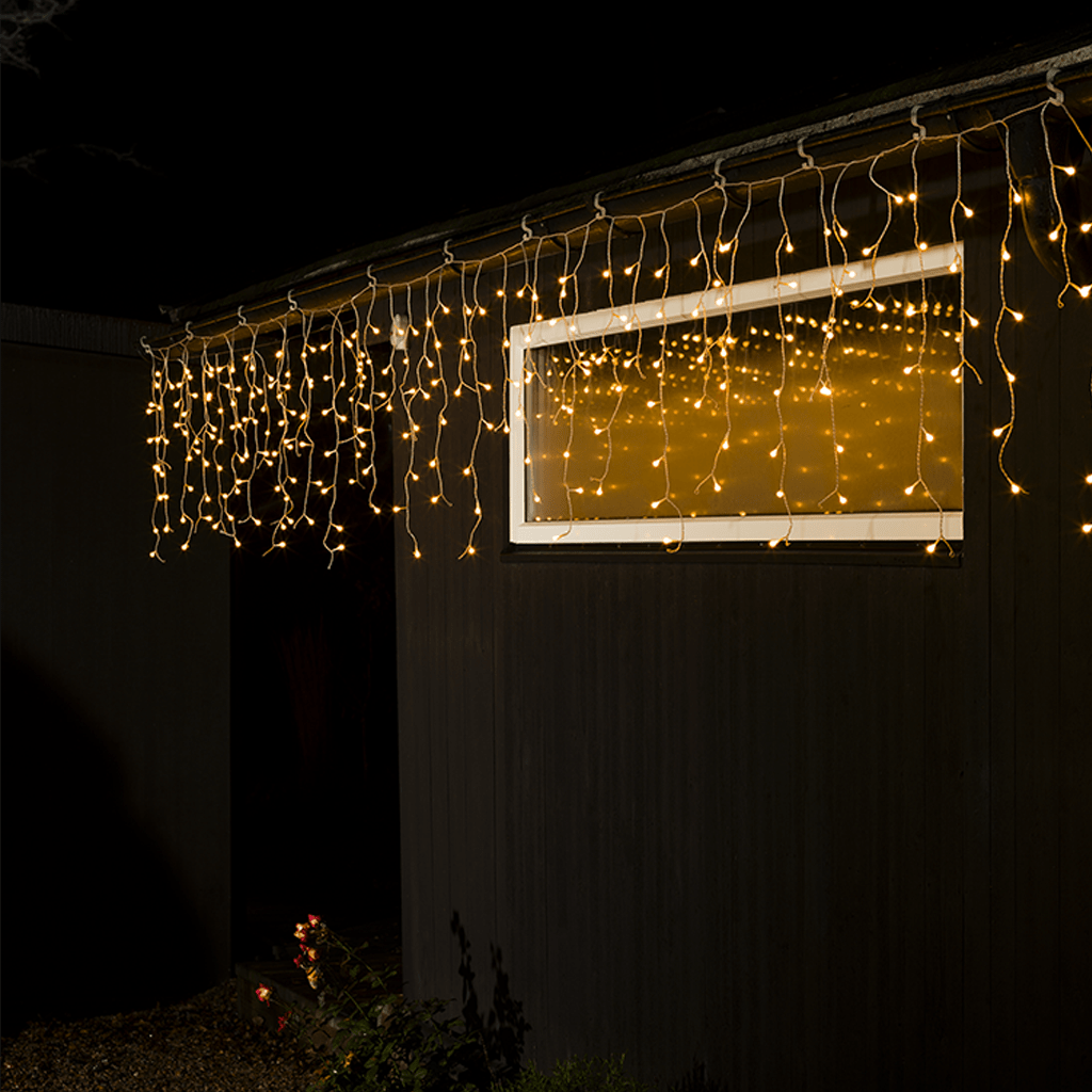 LED Solar Eisregen Lichtervorhang 200 bernst. LED außen - WeihnachtsladenKonstsmide