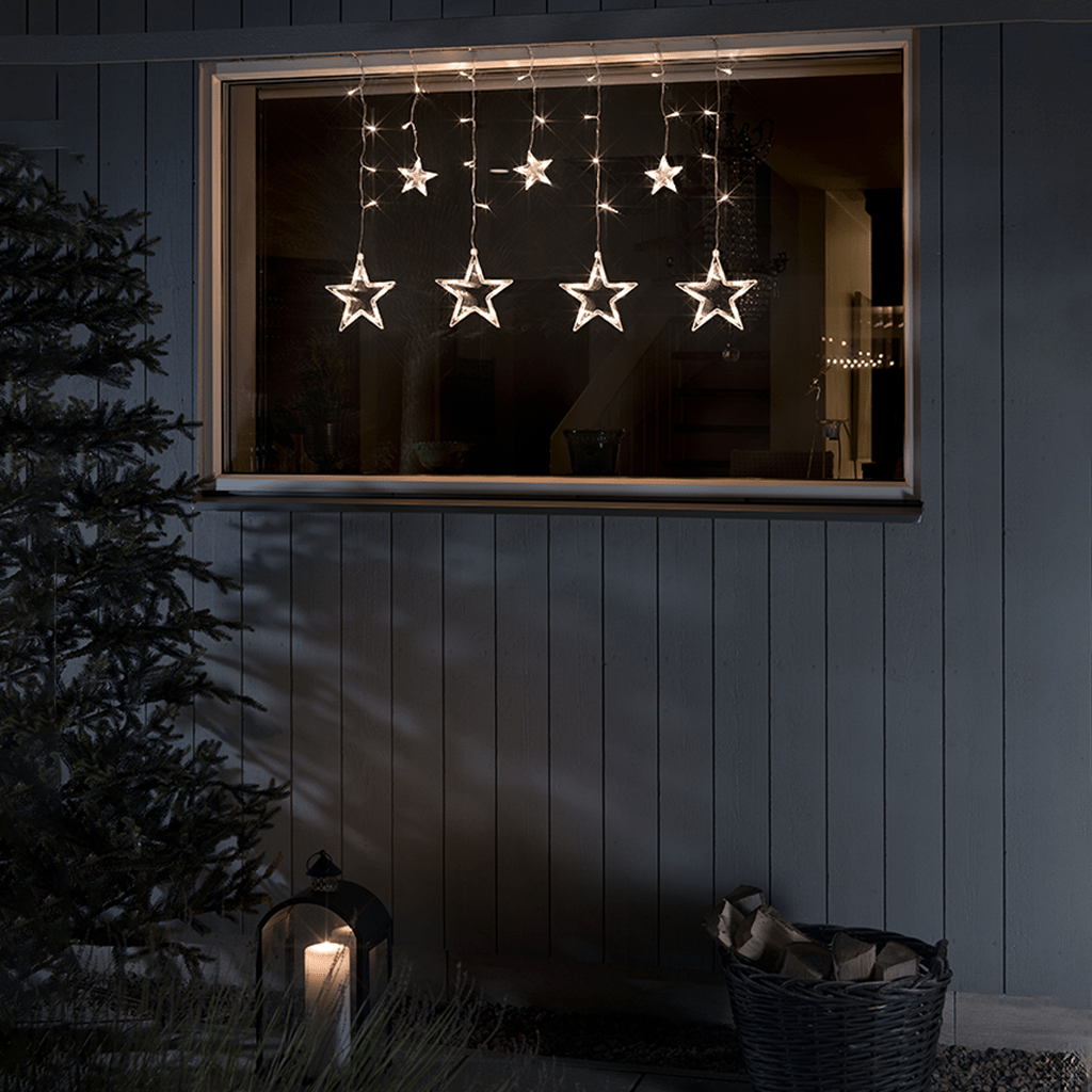 Sternen LED Lichtervorhang mit 77 bernsteinf. LED - WeihnachtsladenKonstsmide